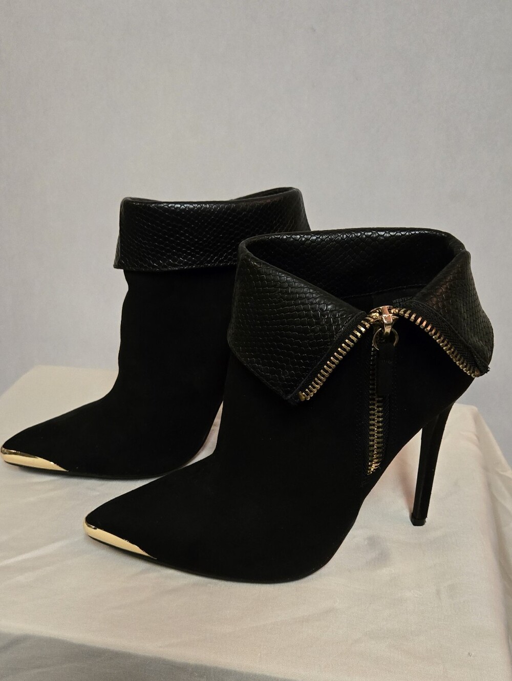 Shoedazzle Women's Black Pointed-Toe Stiletto Ankle Boots with Gold Accents